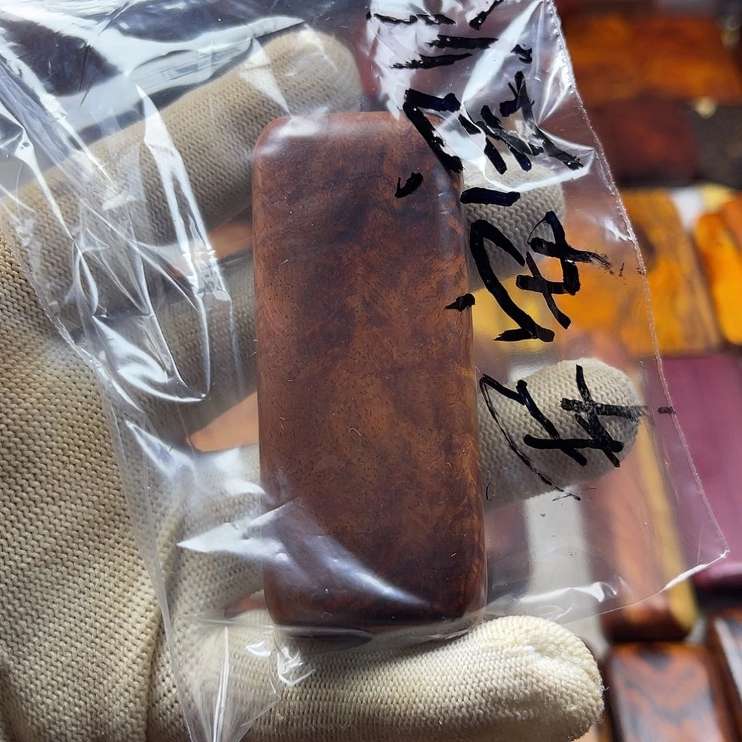 稳定木安***呀血檀手把件
