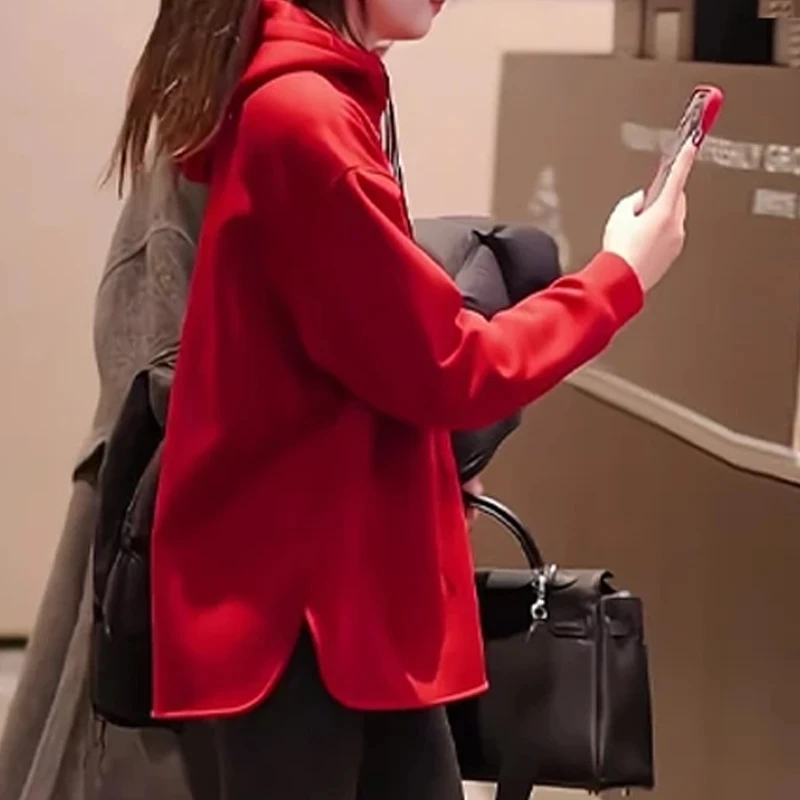 设计感半拉链时尚百搭连帽卫衣女冬季新款欧韩穿搭宽松不规则