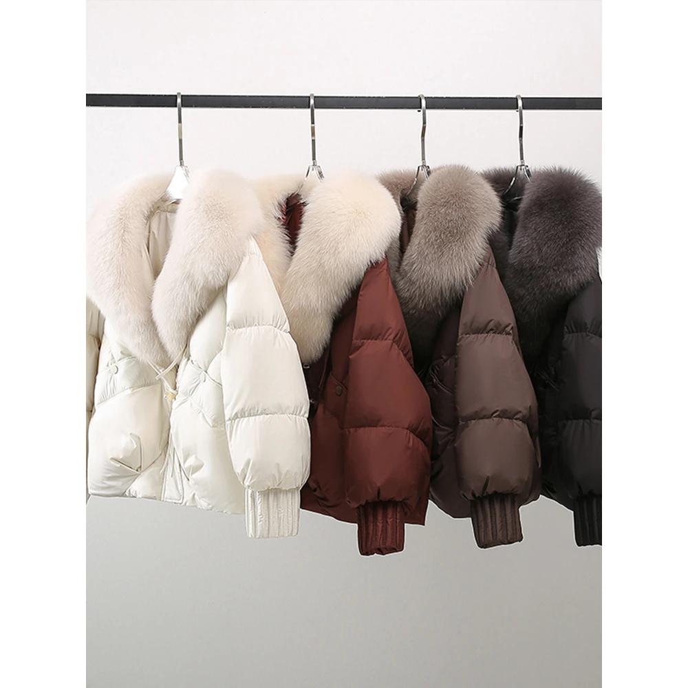 高级感休闲服女2025冬季新款时尚保暖大毛领设计感气质外套拼接