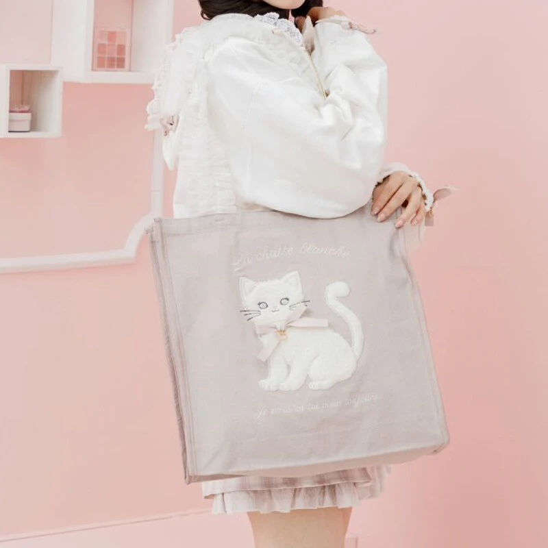 ROJITA · 蝴蝶结猫咪贴花薄纱手柄单肩包包(5516214现货)