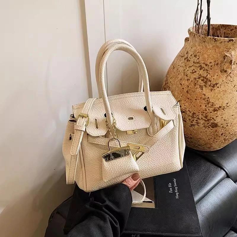 高级感手提凯莉包包女2025新款潮百搭荔枝纹铂金包小众单肩斜挎包