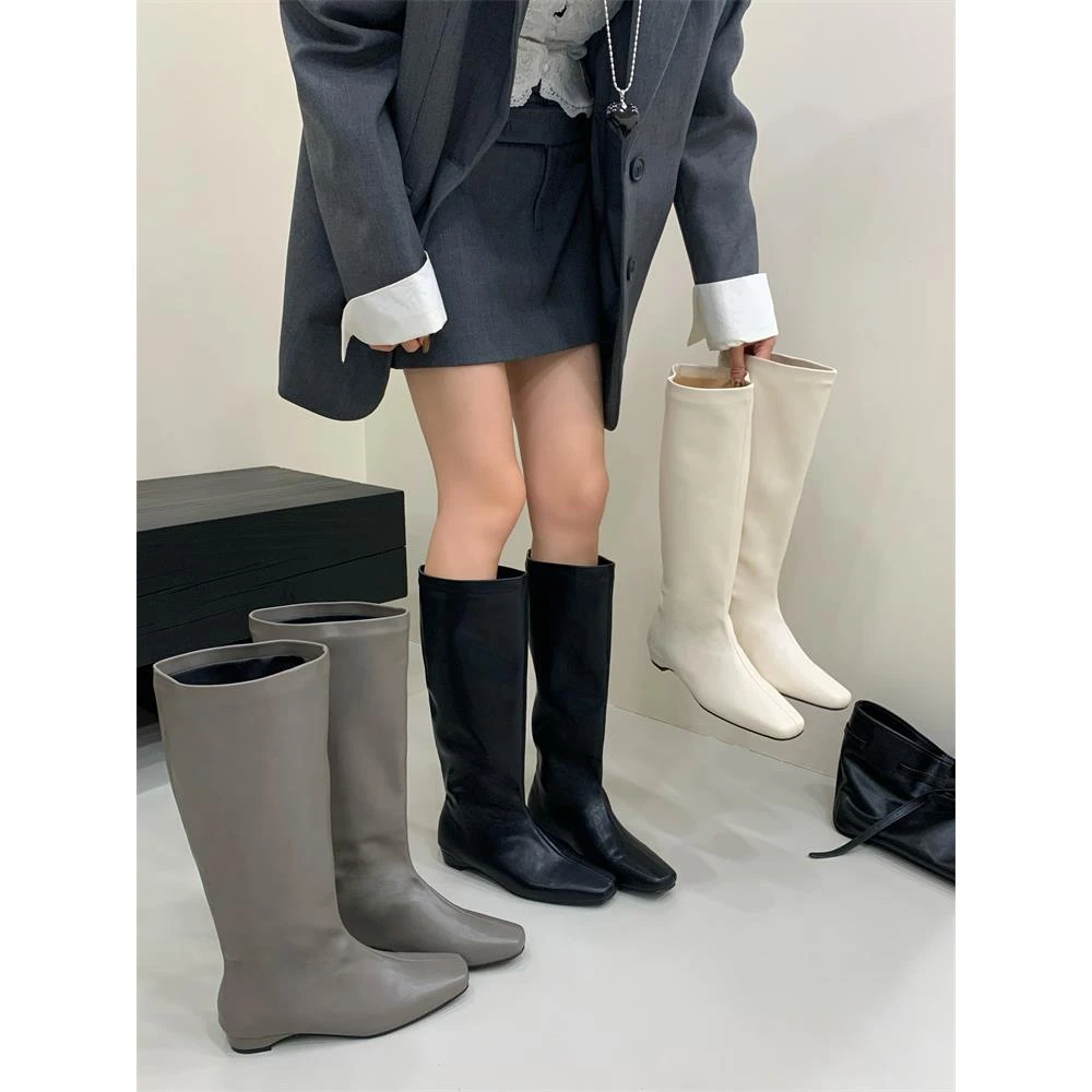 轻奢靴子女款爆款2025新款多巴胺质低跟骑士靴女套筒中筒靴高筒靴