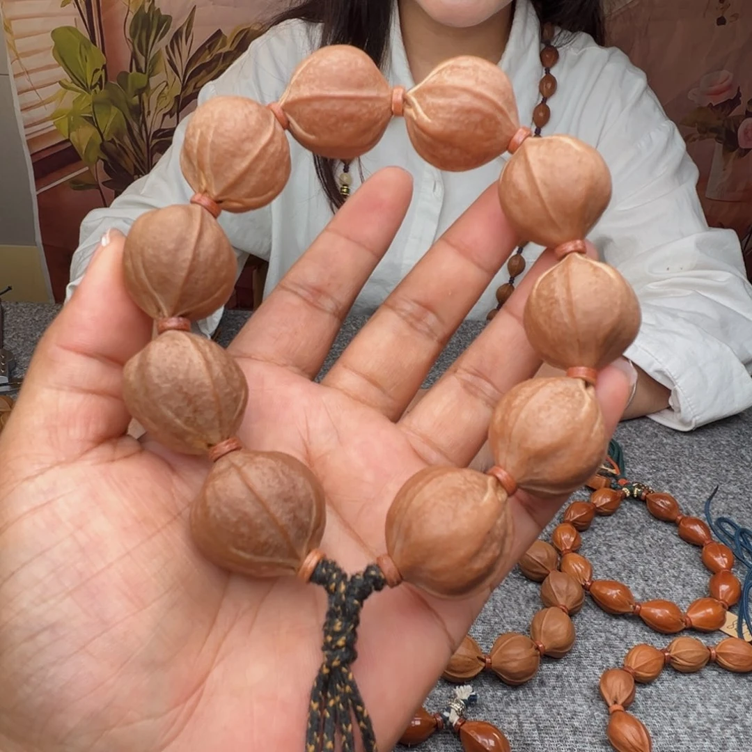 匸***㕕橄榄核手串梅林铁核23*25素串鲨鱼背
