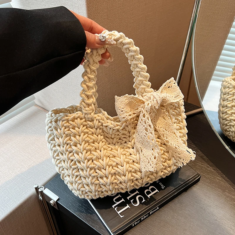 艾米兔女包2025新款洋气海边沙滩包时尚编织蝴蝶结设计手拎草编包