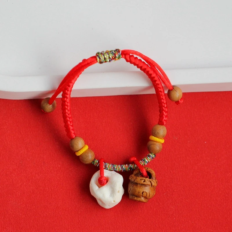 非金属木质手链 宝宝桃核猪惊骨新生儿手链打磨红绳编织手绳