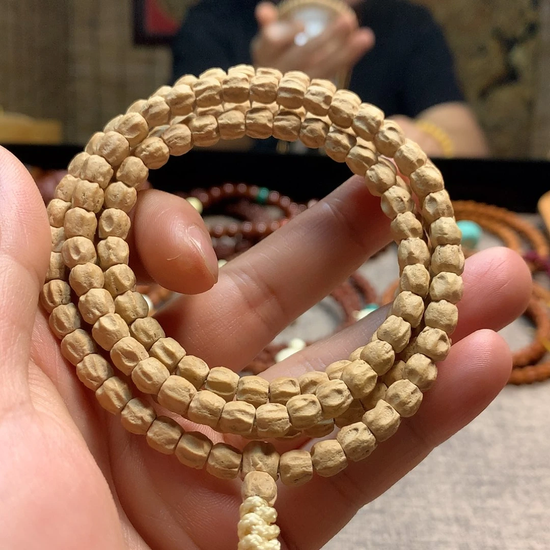 柏香籽/百香籽吊坠粉皮方块单眼双坑