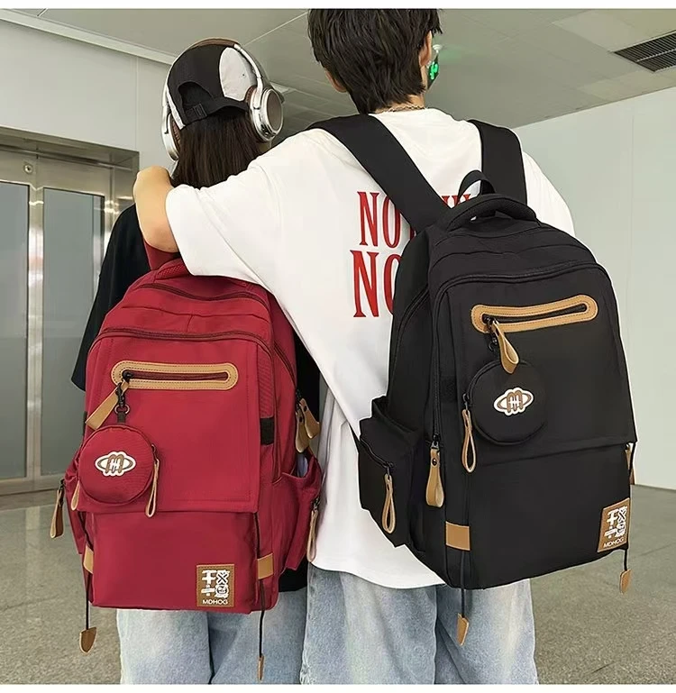 淘美包时尚减负男女小学初中高中大学户外双肩背包  001一100