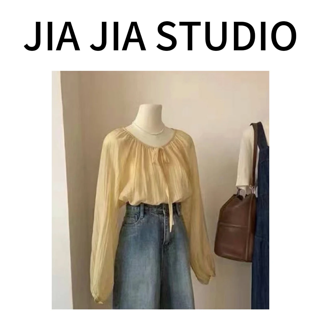 嘉嘉推荐#9312【夏款】气质复古温柔风圆领系绳宽松百搭防晒上衣