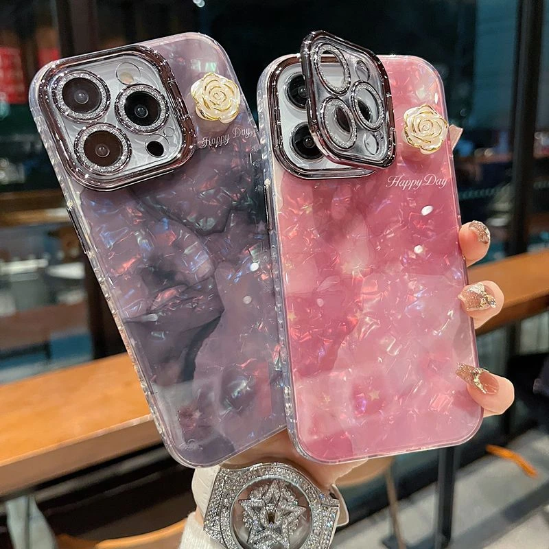 适用苹果系列iPhone16新款手机贝壳纹晕染山茶花银色闪粉镜头支架