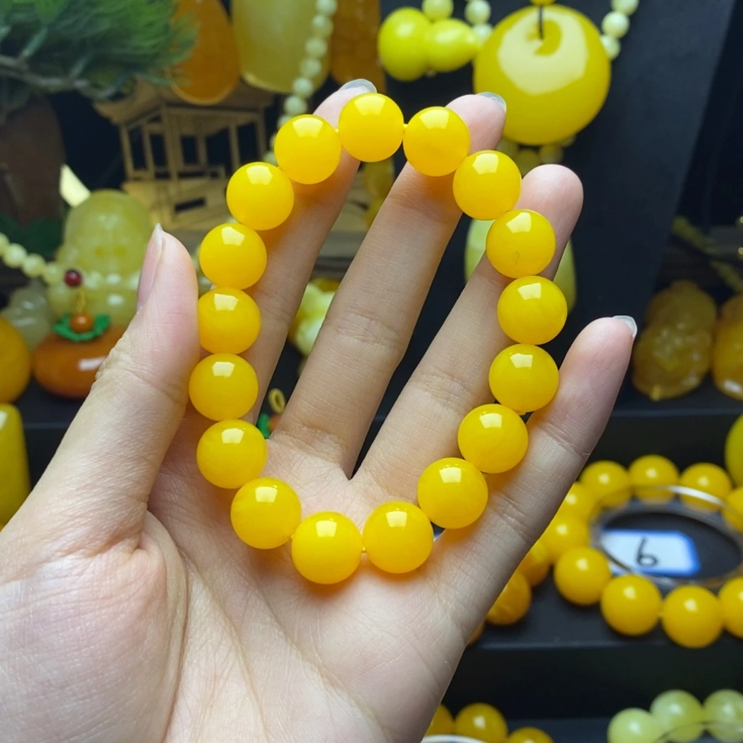 U***米非金属全品无暇鸡油黄手串12