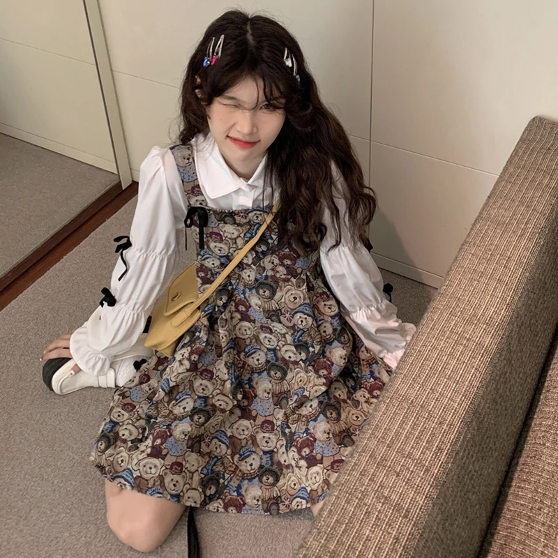 复古小熊背带裙女秋季设计感法式小众收腰显瘦A字假两件连衣裙