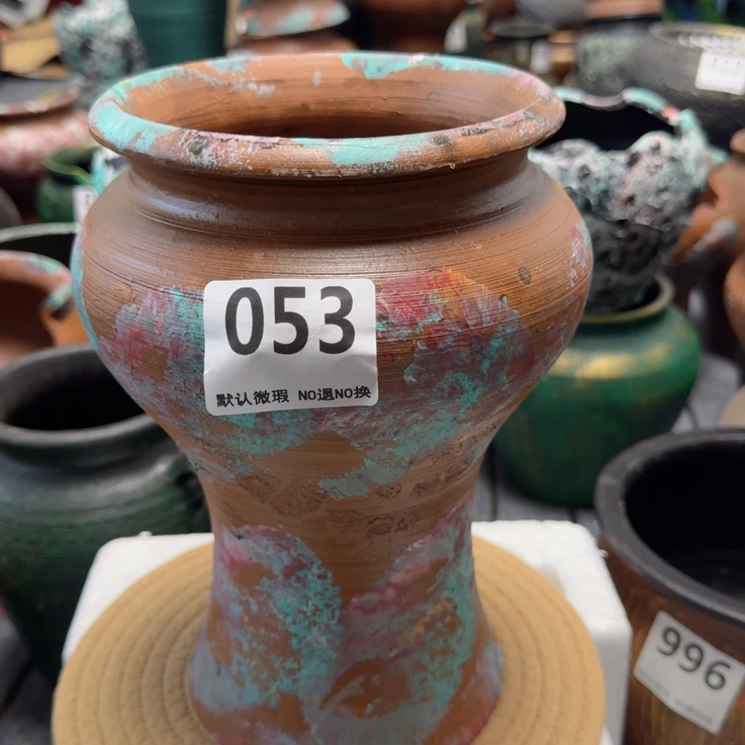 瑕疵053带孔高度 25口径15底部窑裂