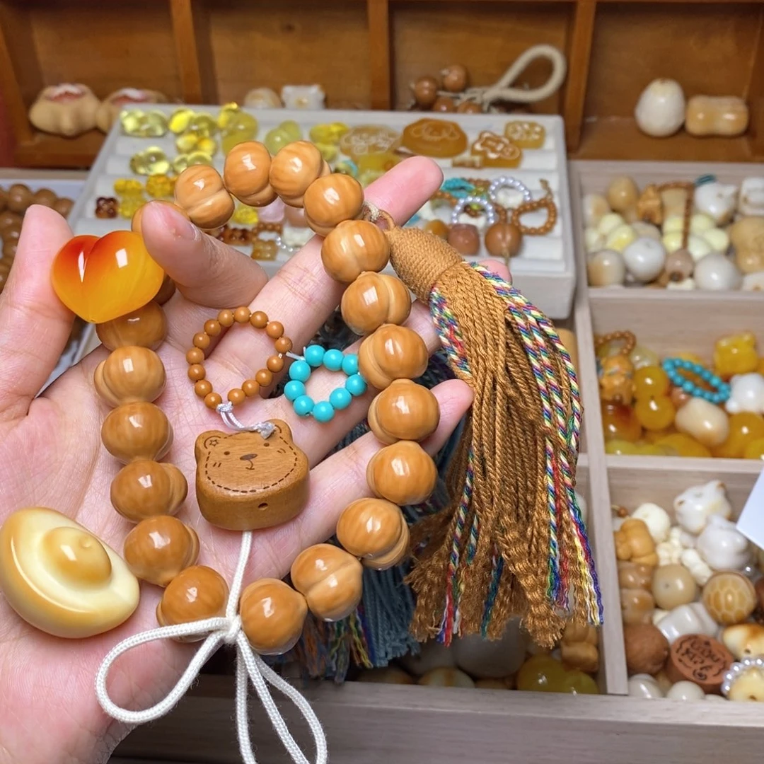 木***孩手串猴头核桃屁桃15元宝熊头棕流苏爱心绿卡棕跑