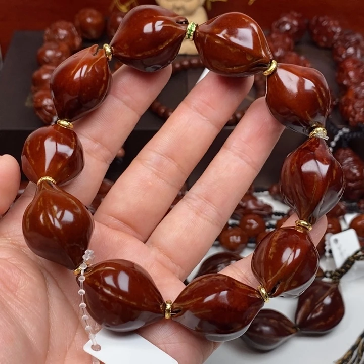 橄榄核吊坠涛8888889989