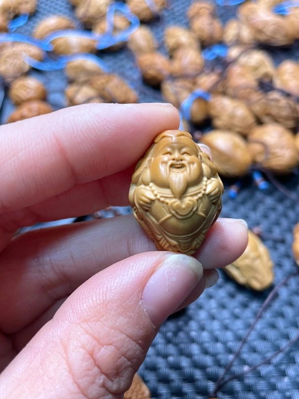 橄榄核单粒荷叶财神