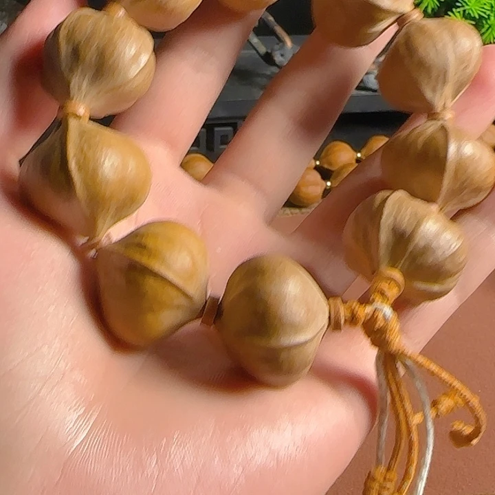 无***看橄榄核4花2.5手串