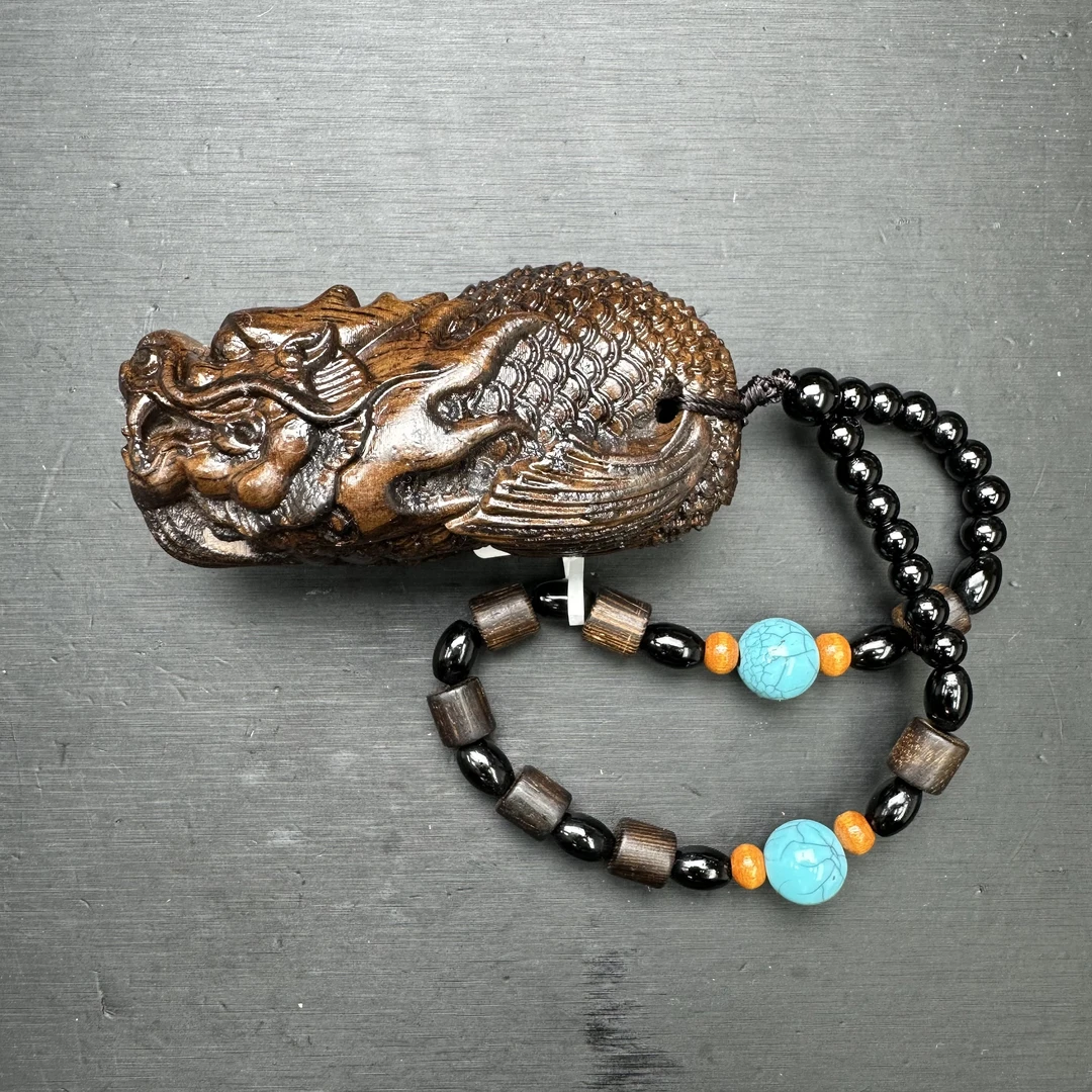 465开师兄木质手把件