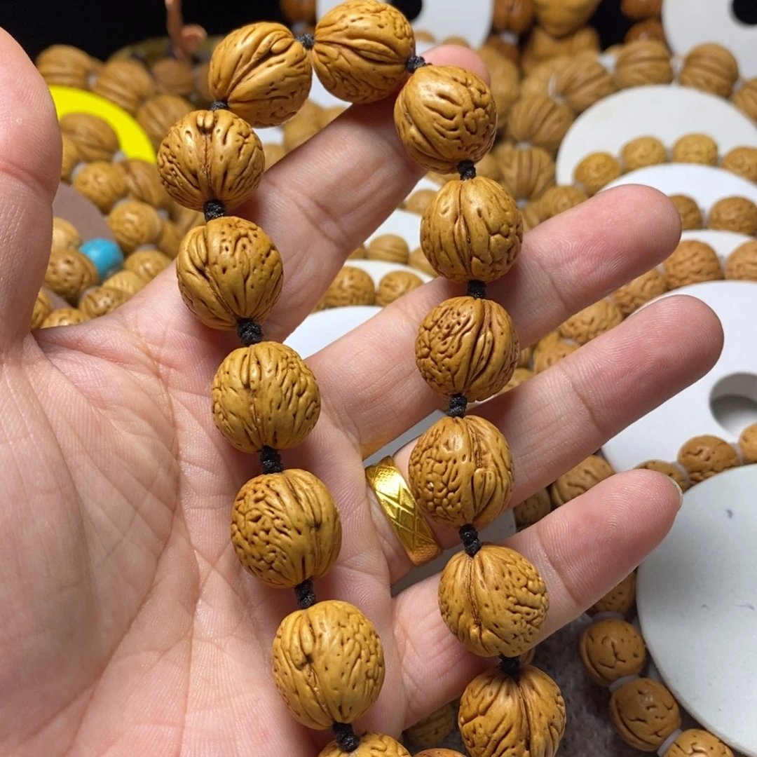 桃核手串大**、生命桃核手串