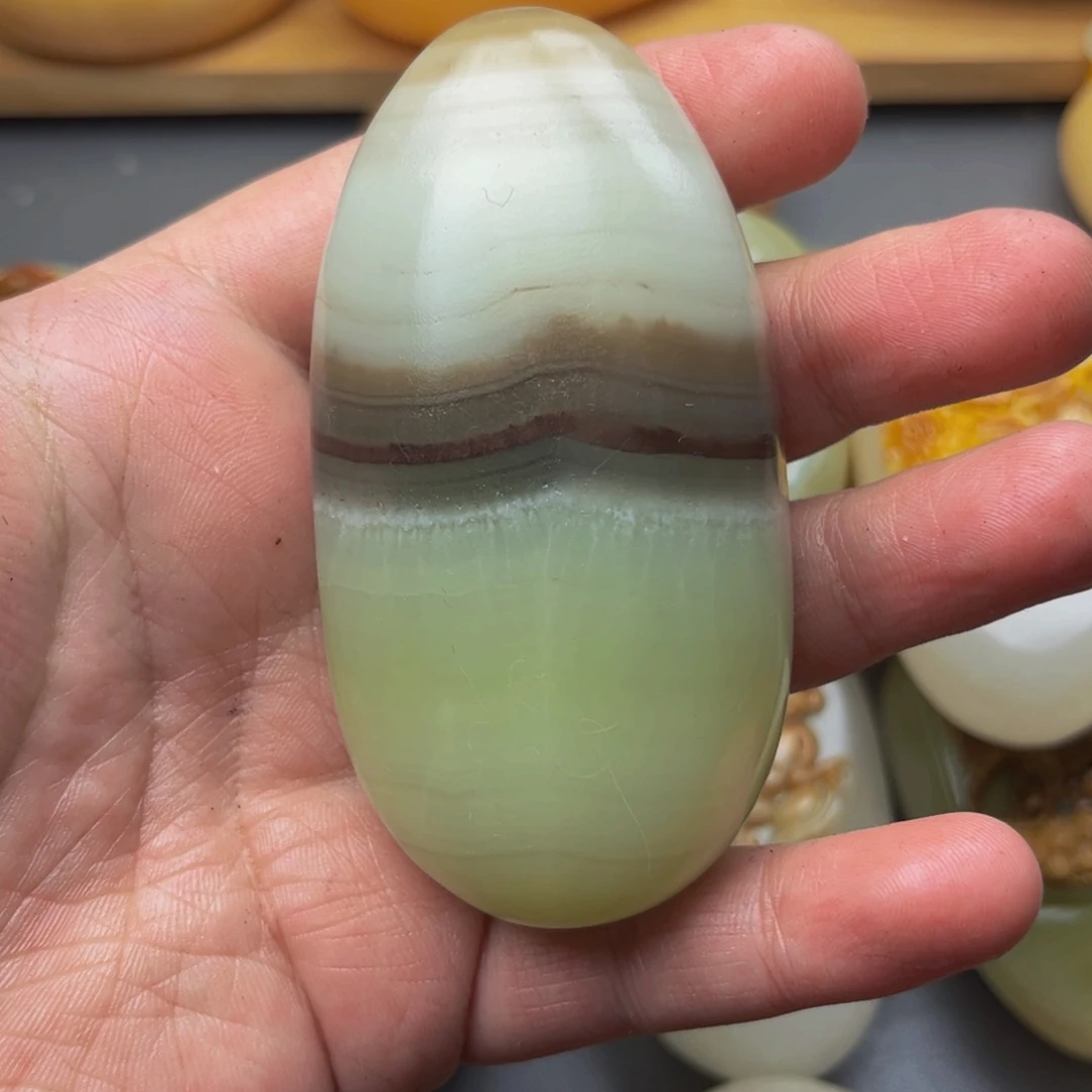 奇***奇石材方解石手把件