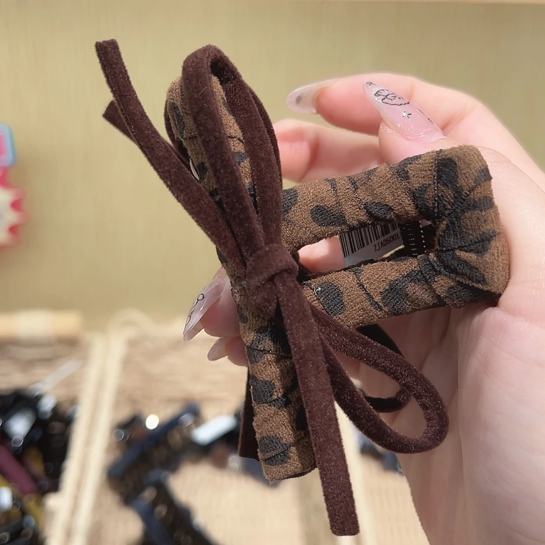 仿珍珠非金属豹纹蝴蝶结中抓