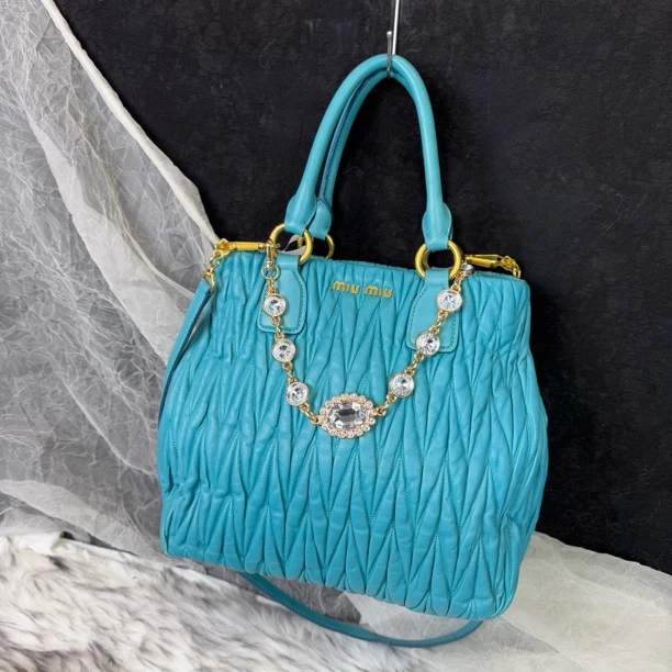 95新 MIU MIU/缪缪 湖蓝色褶皱手提斜挎托特包