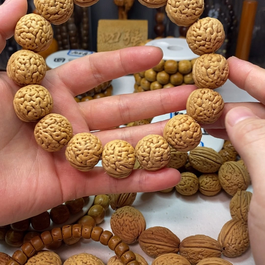 小***@桃核吊坠盘锦野生肌肉纹