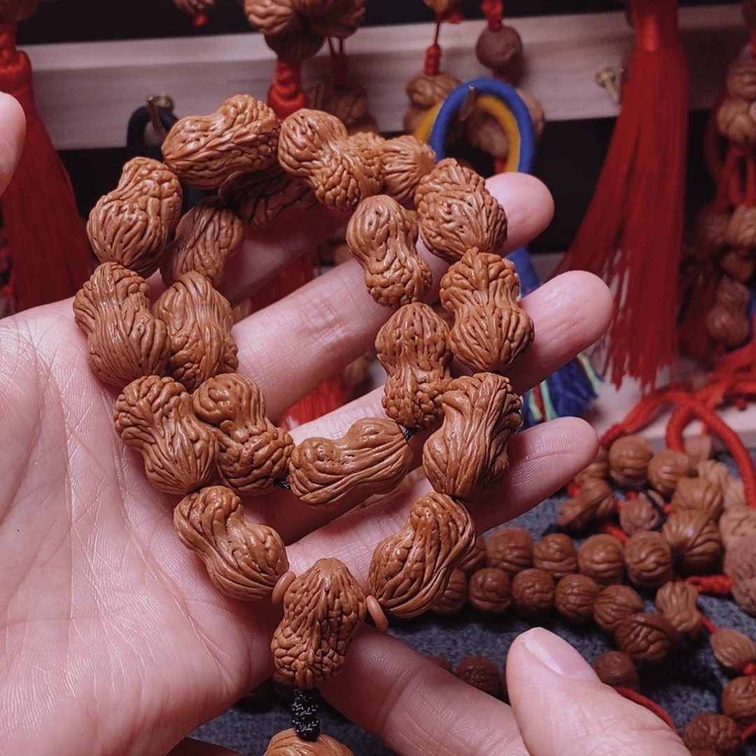 桃核吊坠桃枭手持