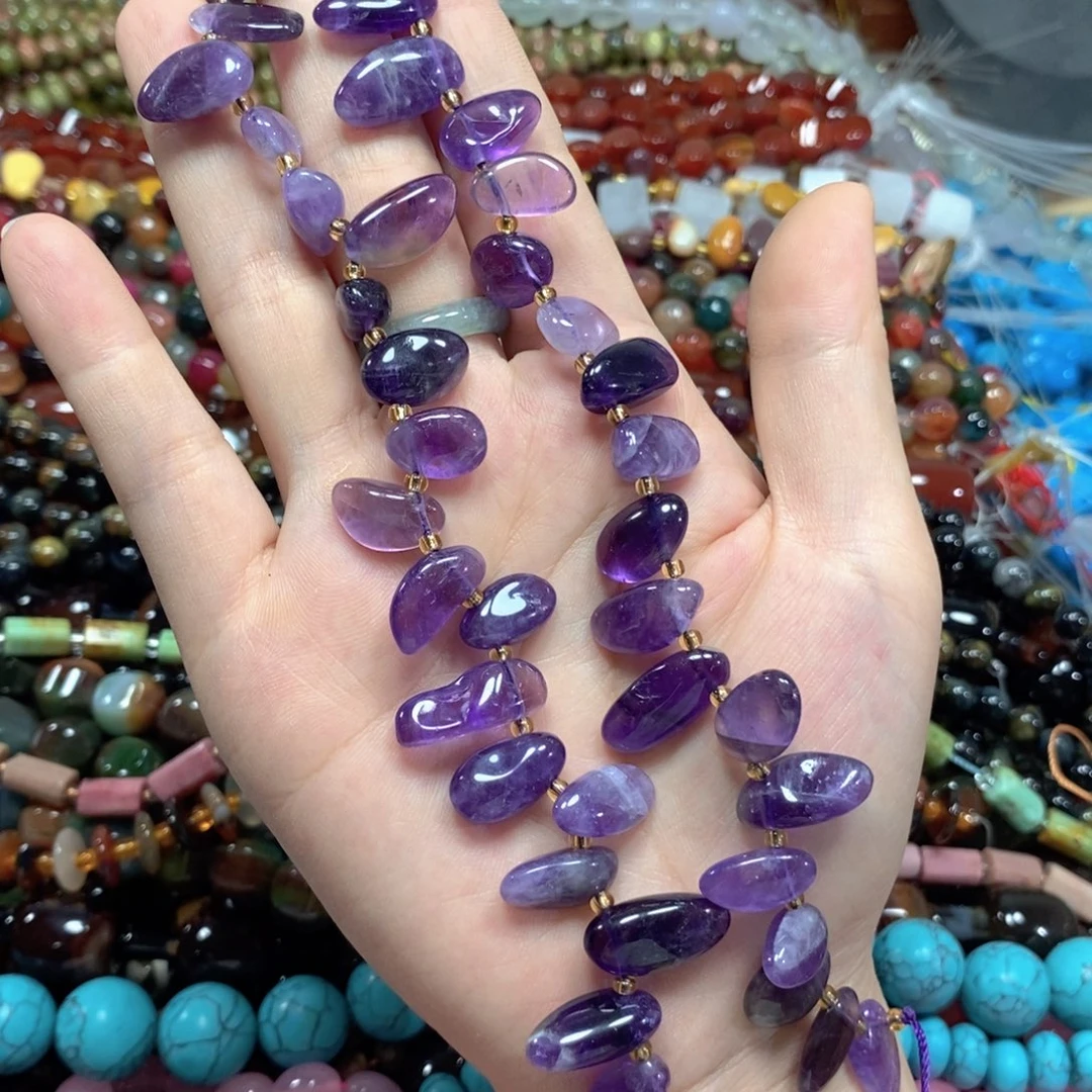 玛瑙/玉髓未镶嵌珠宝半成品紫晶长牙一条