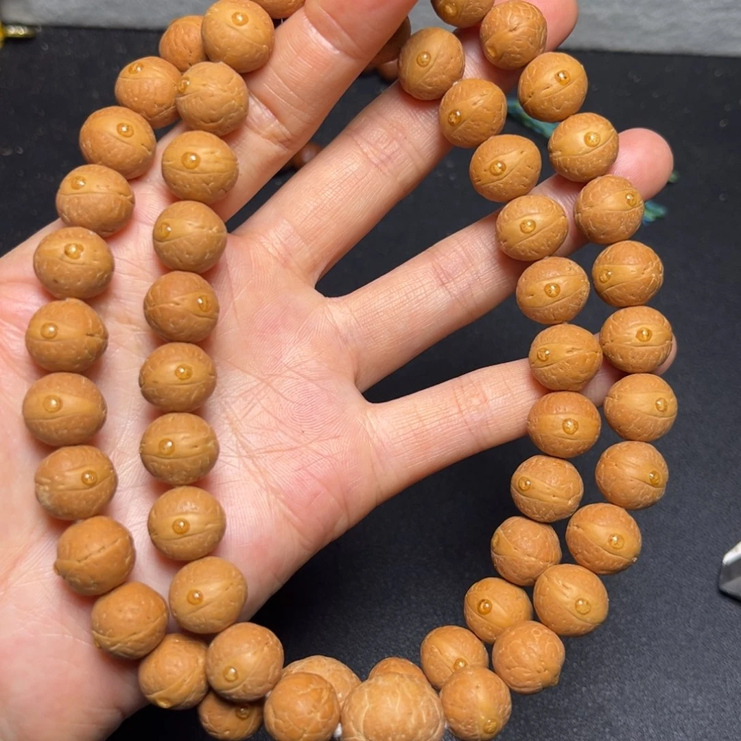 凤眼菩提吊坠13mm精品27颗手持