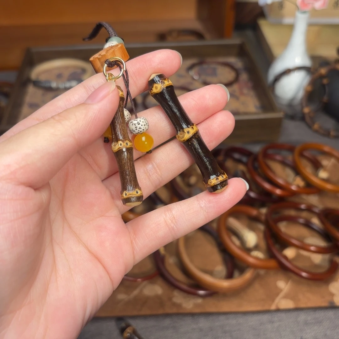 得***洋木质非金属紫竹钥匙挂