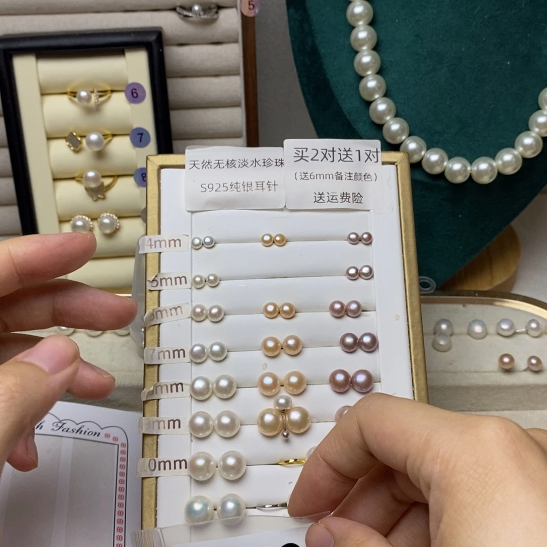 。***银S925镶嵌淡水珍珠耳饰