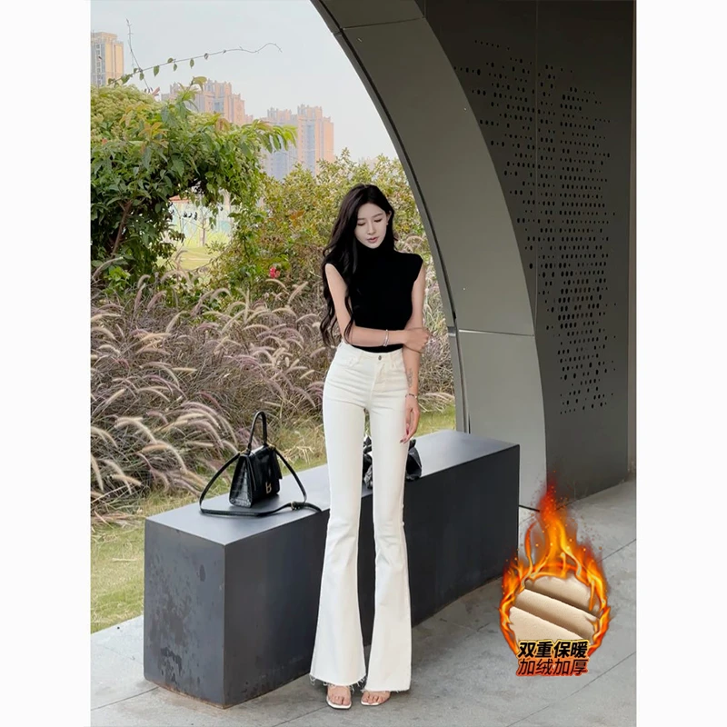 加绒白色毛边高腰弹力紧身牛仔裤女2025年冬季新款显瘦喇叭长裤