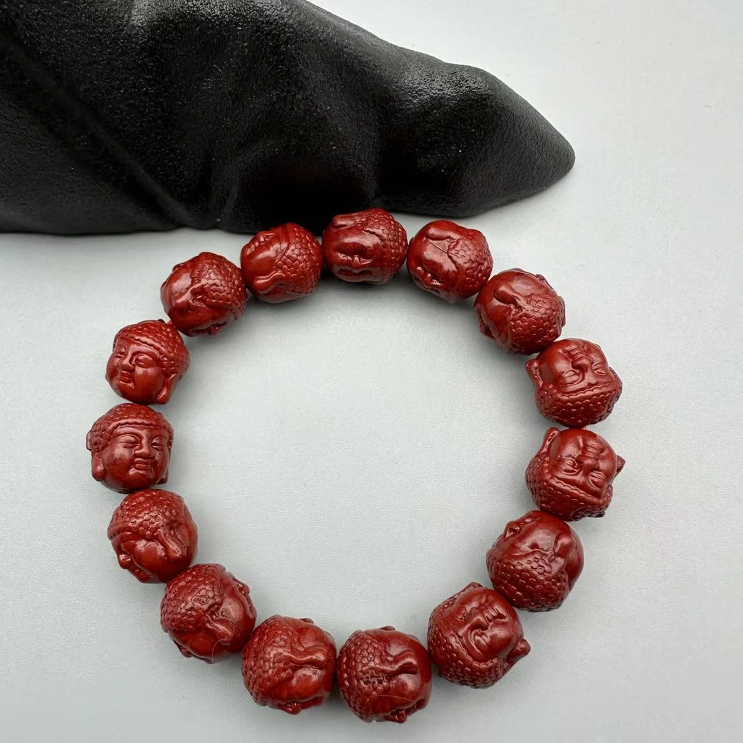 含辰砂工艺品含辰砂工艺品ZA750-经典紫金砂雕刻宝宝佛头手串