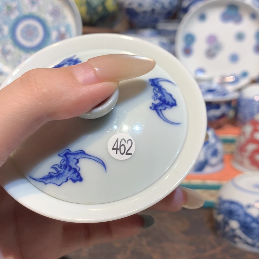 春***明462麒麟踏浪盖碗釉下红彩