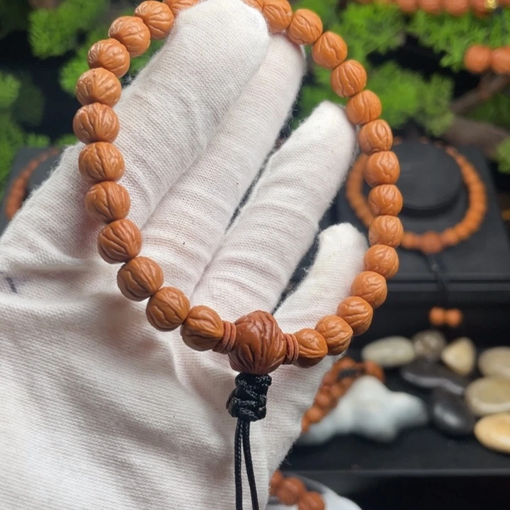 好***⁸桃核吊坠精品手持