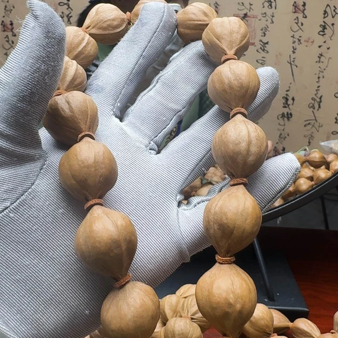 陈***鹏橄榄核手串水晶核