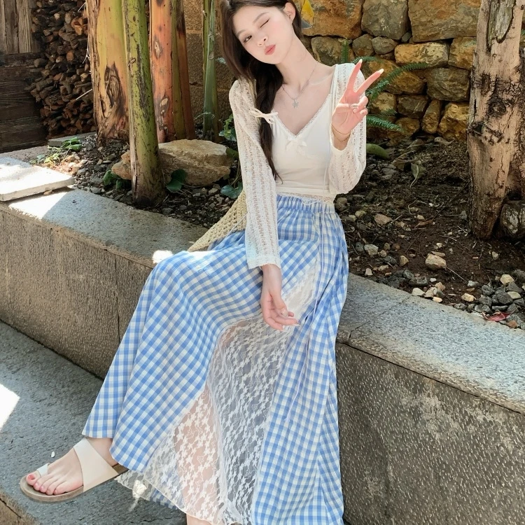 甜美蕾丝拼接格子A字半身裙女夏季2025新款设计感显瘦大摆长裙子