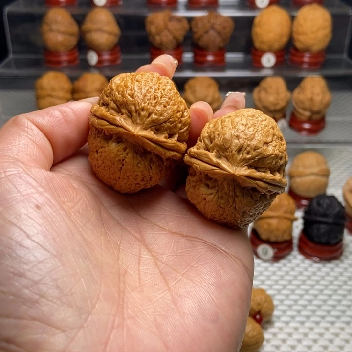 桃核把件9罗汉。。