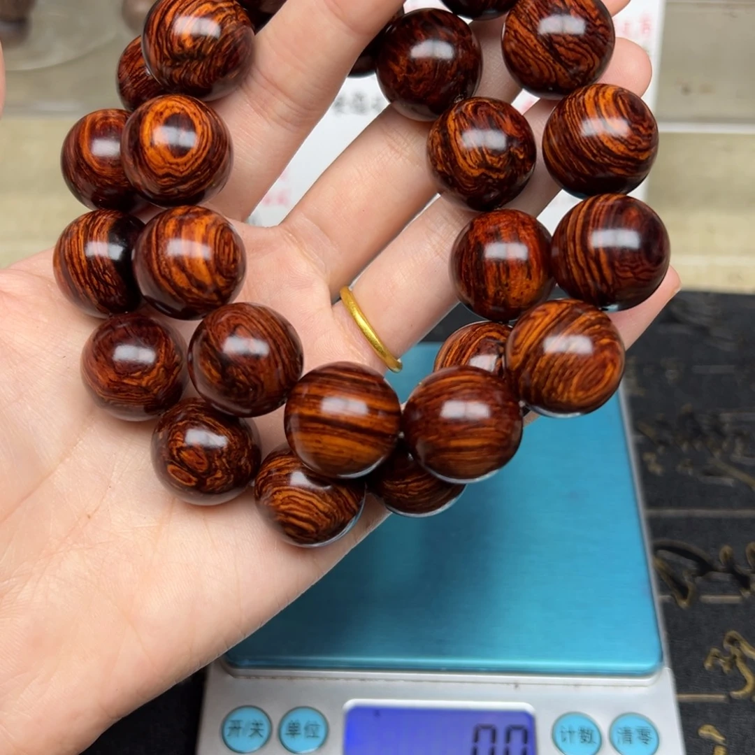 用***1木红降18圆珠黑金树心油虎皮纹