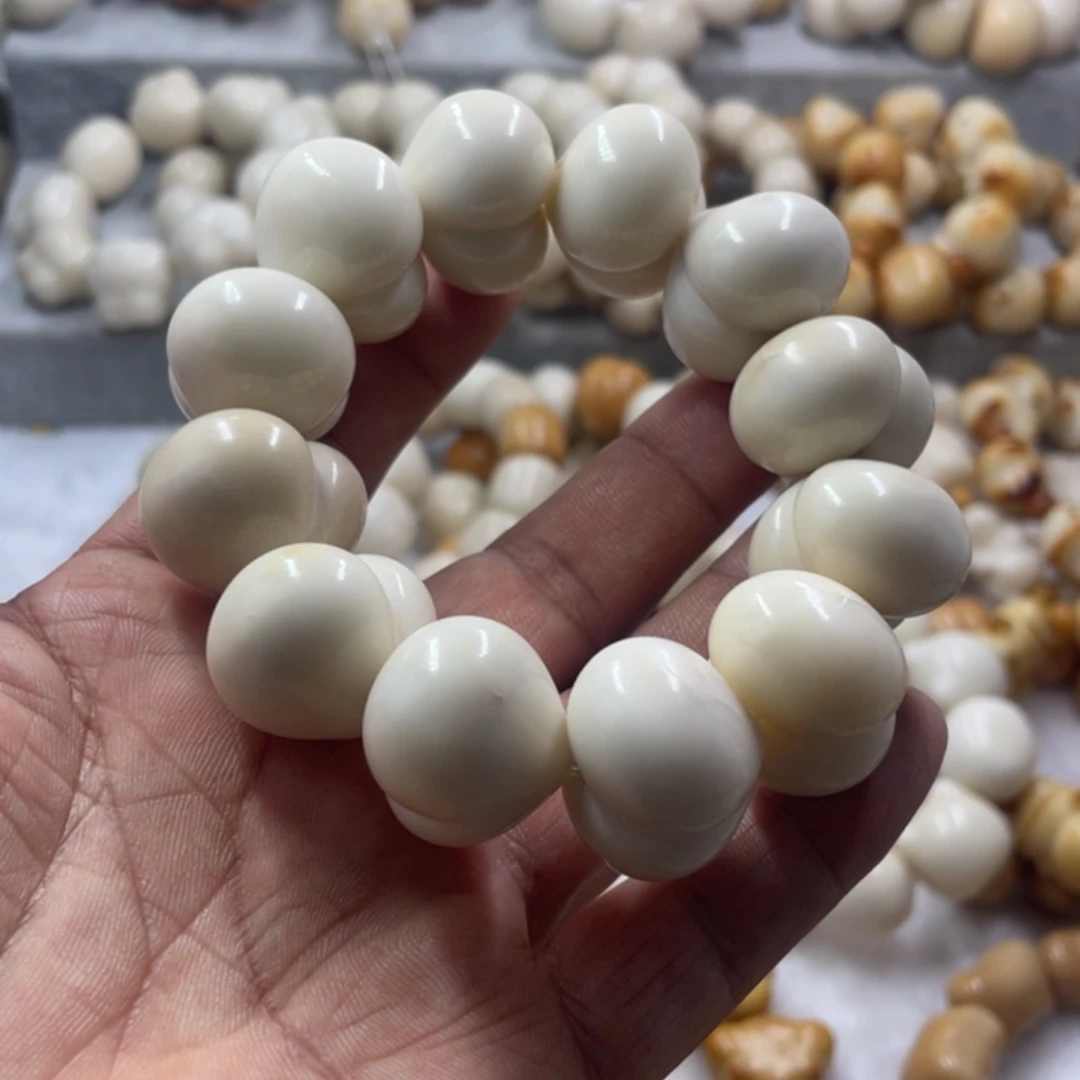 吊坠菩提根/象牙果微瑕象牙果光面屁桃手串卡23