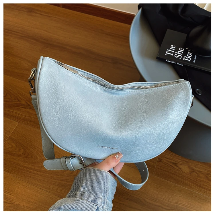 高级质感女士包包2025春夏新款潮流百搭斜挎包小众设计单肩水饺包