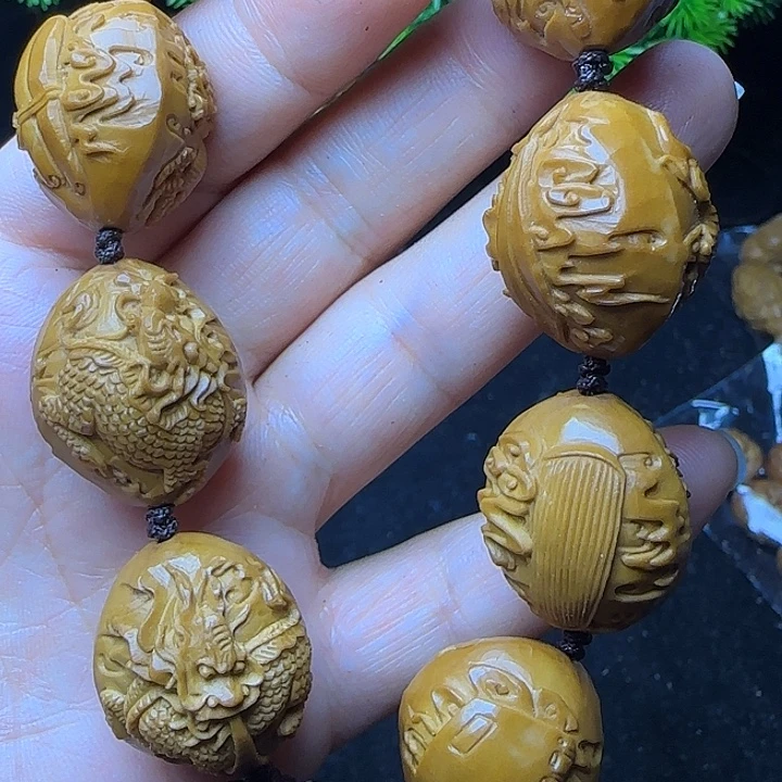 水***梦橄榄核雕刻手串瑞兽