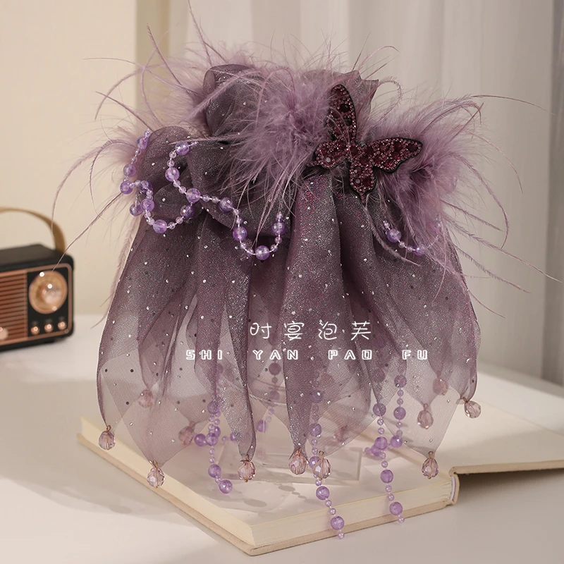 秋季恋歌鲨鱼夹新款蝴蝶裙摆抓夹原创设计流行高级羽毛流苏发饰女