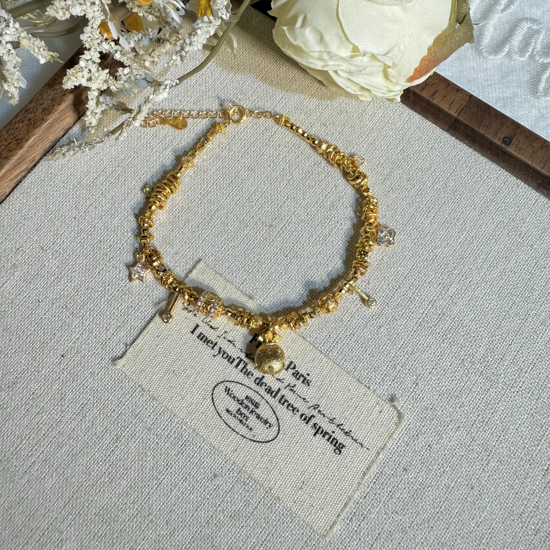 925银手链 满锆s925银镀金福袋流苏盘缠设计款手链