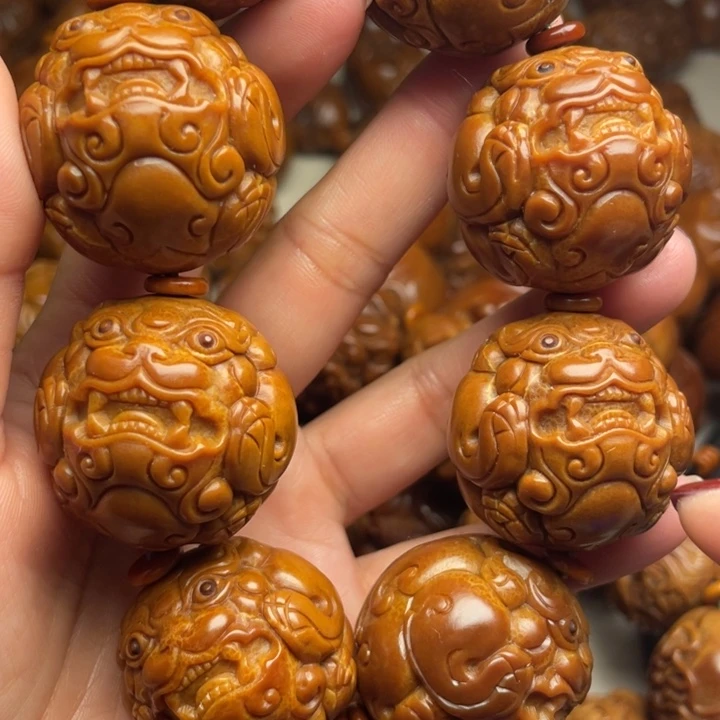 一***逢橄榄核吊坠橄榄核手持