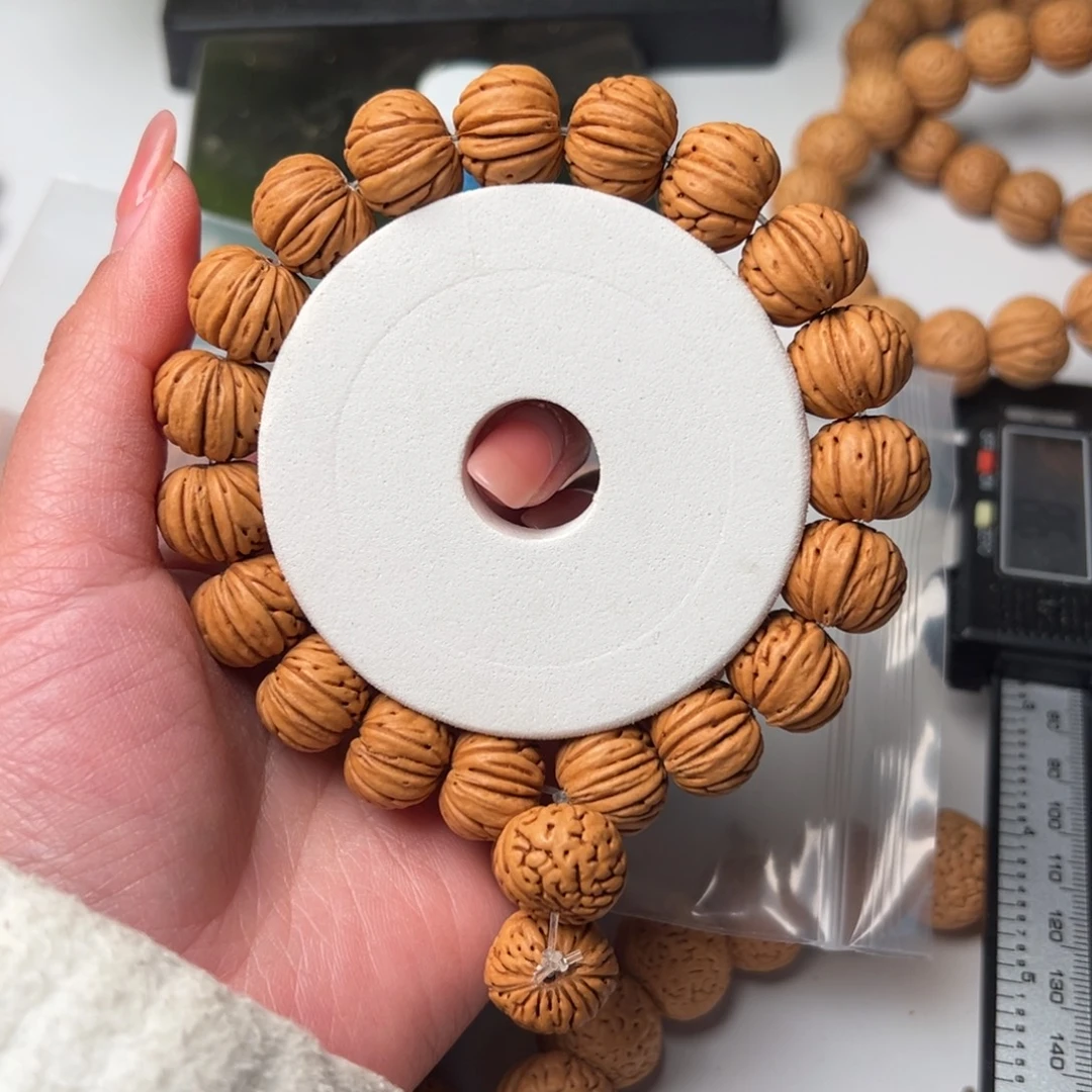 彤***彤15➕尺寸树王纽扣桃核