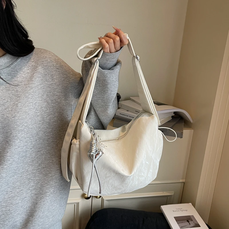 饺子包包女2025新款休闲单间包大容量学生上课日系ins百搭斜挎包