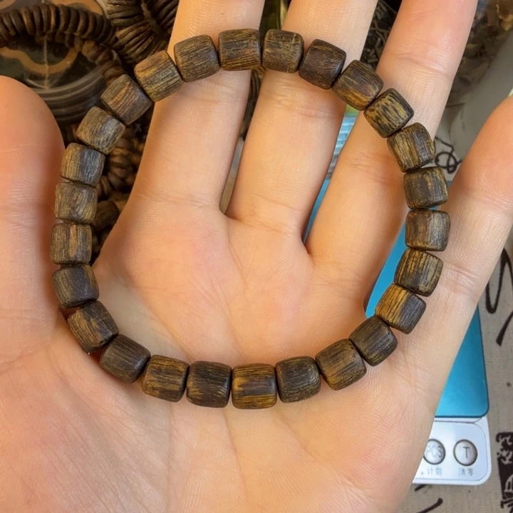 沉香碎屑沉香莺歌绿奇楠07沉水桶珠8.克