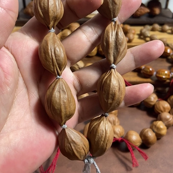 橄榄核手串20 x31四花老油核
