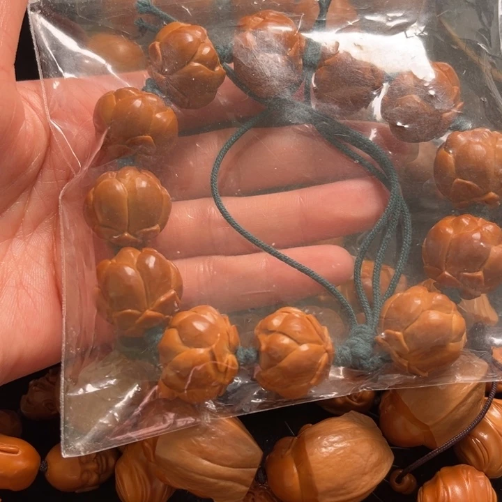 梦***举橄榄核手串莲花20